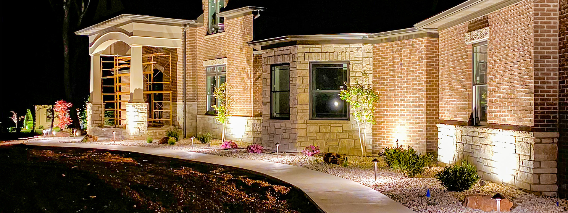 Landscaped House with Lighting Features